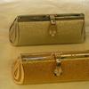 Item 492: Purses gold and silver, call for pricing